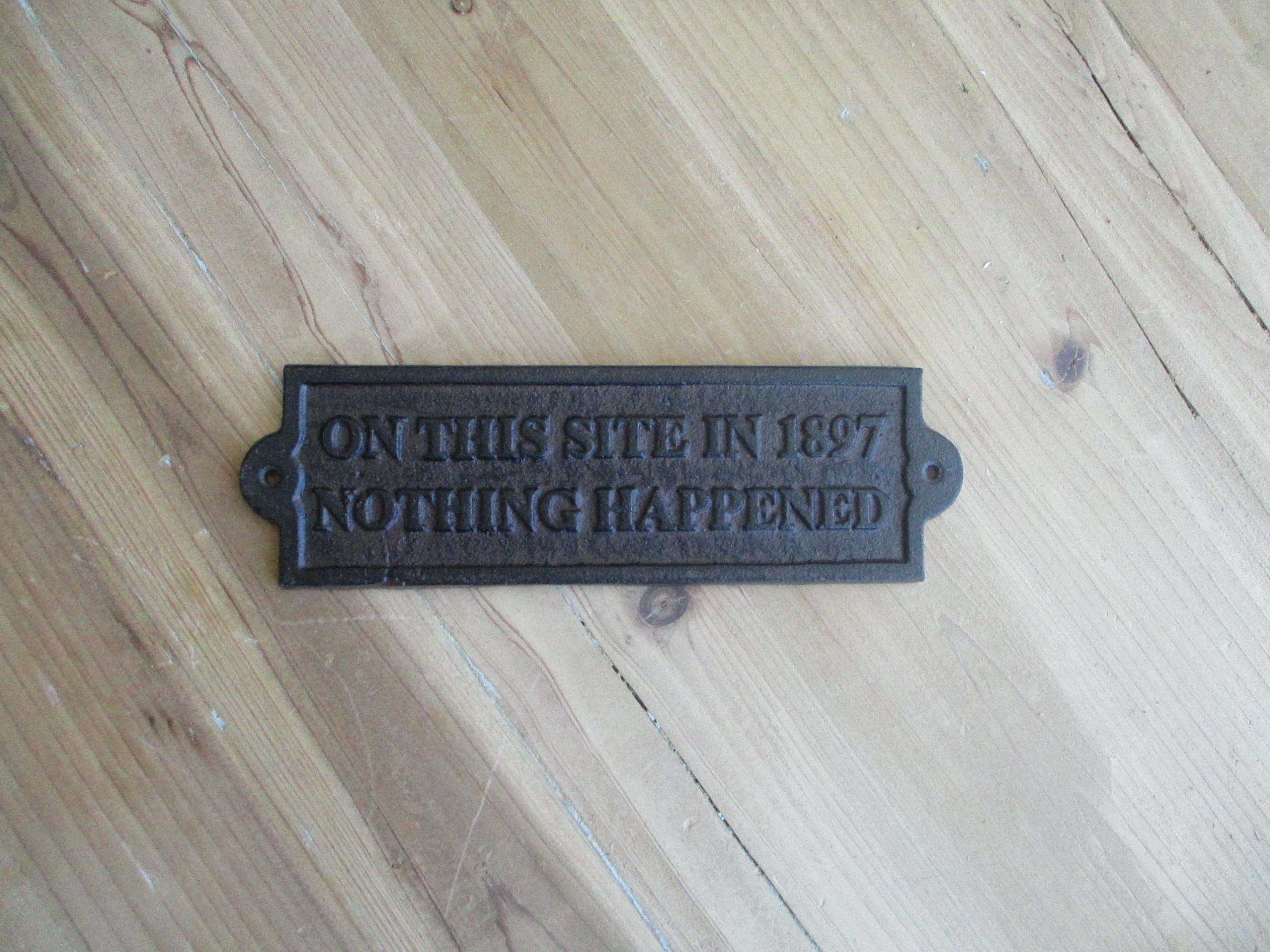 On This Site Nothing Happened-1897 Cast Iron Wall Plaque 